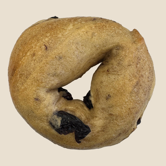Cinnamon Raisin Bagel on a white plate