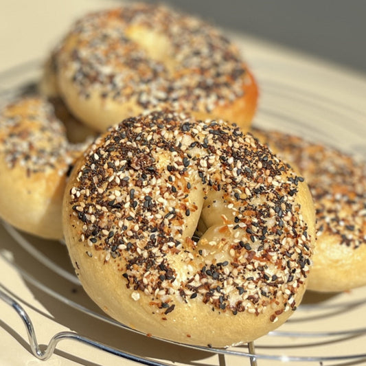 Everything bagels topped with mixed seeds and seasonings at cafeAtaraxia in Parede. The best bagels in Portugal.